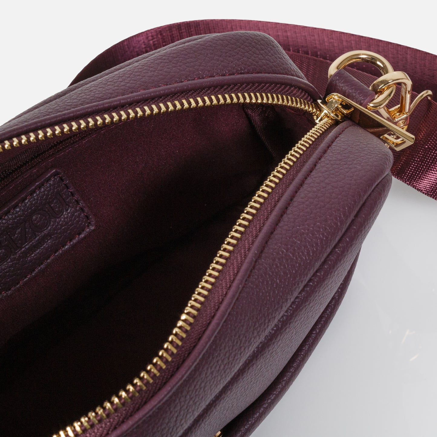 BG253B022BU - Burgundy crossbody handbag in PU with nylon strap
