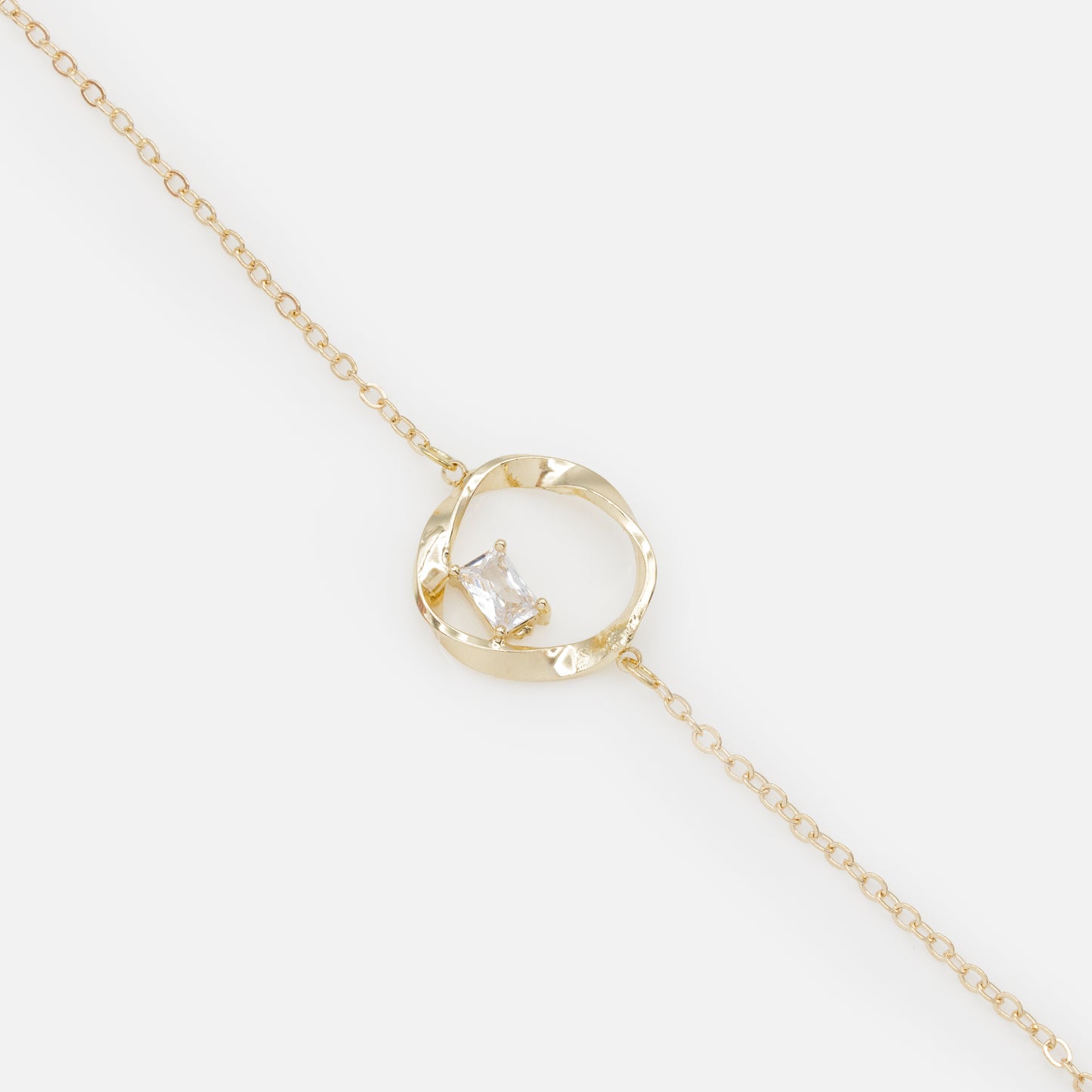 FS253B015GL - Twisted circle golden bracelet with translucent stone