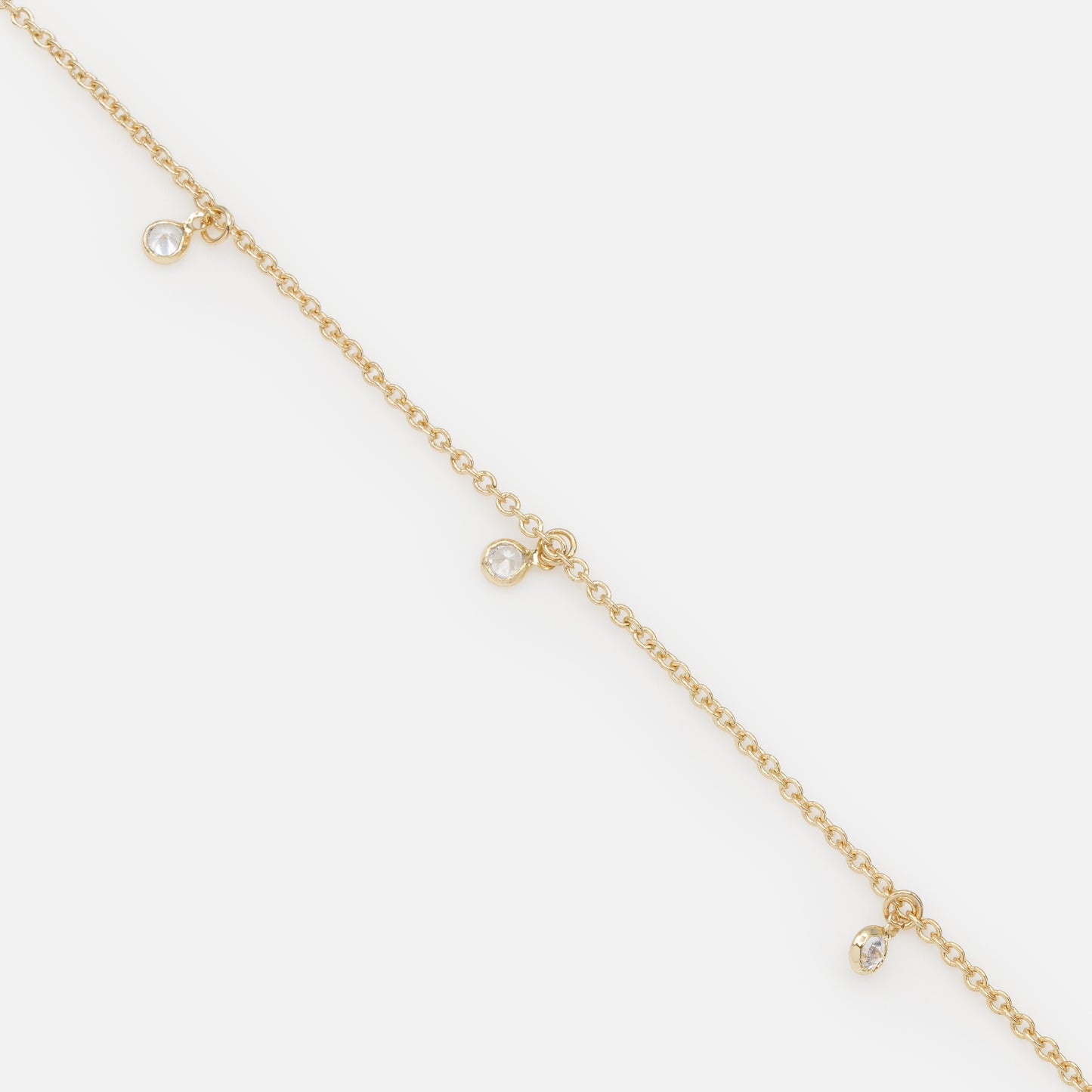 FS253B017GL - Small round charms with cubic zirconia golden bracelet
