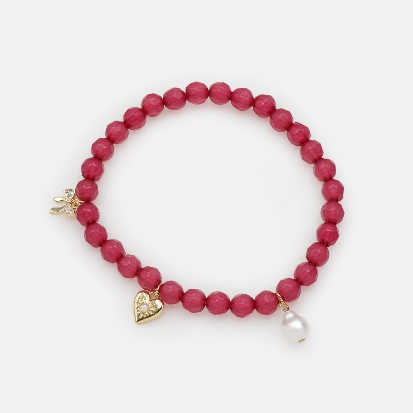 FS253B043MM - Bracelet élastique à billes rose foncé avec trio de breloques