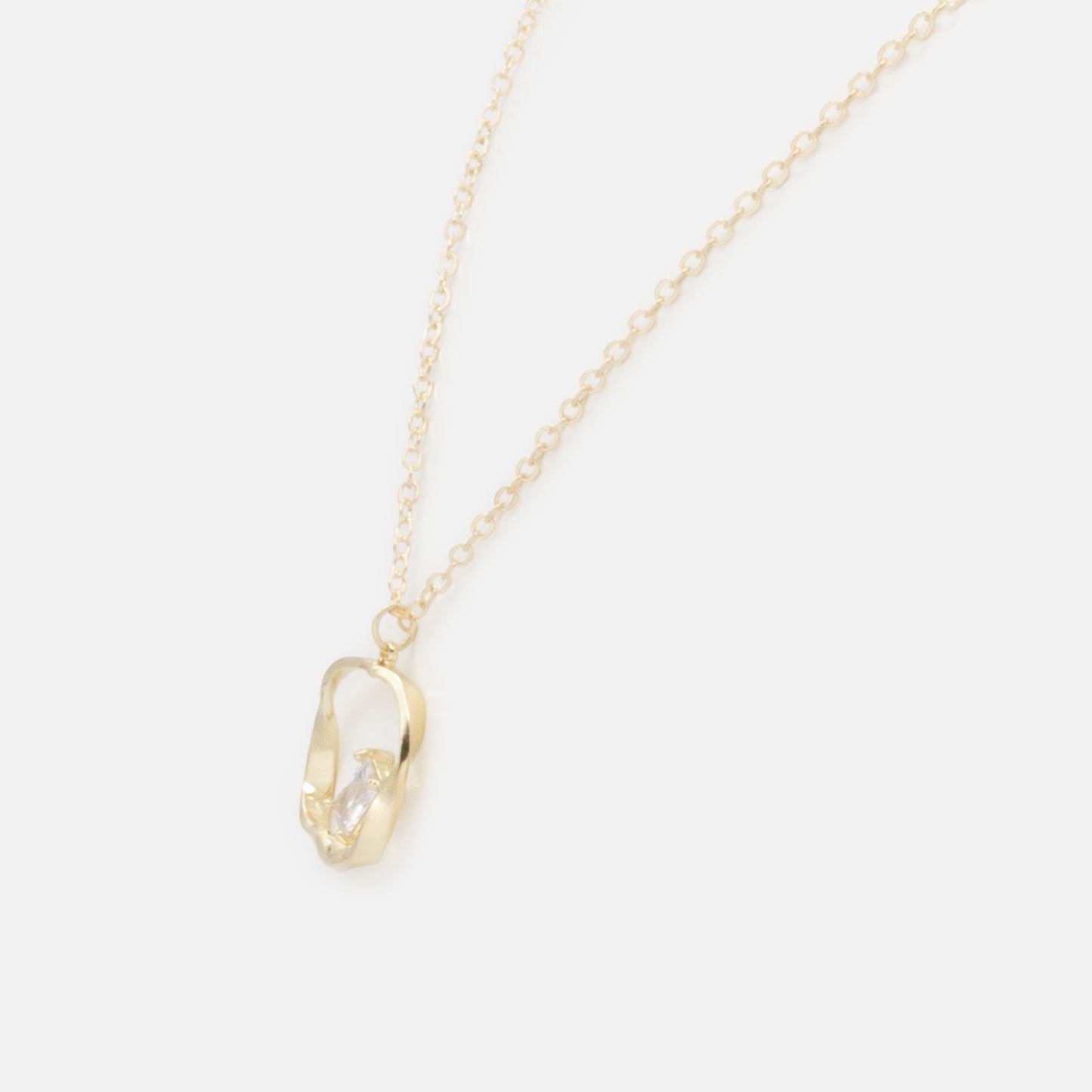 FS253N010GL - Twisted circle charm with translucent stone golden necklace