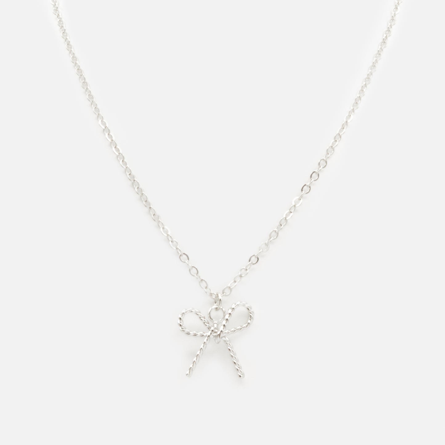 FS253N034SL - Bow shaped charm silvered necklace