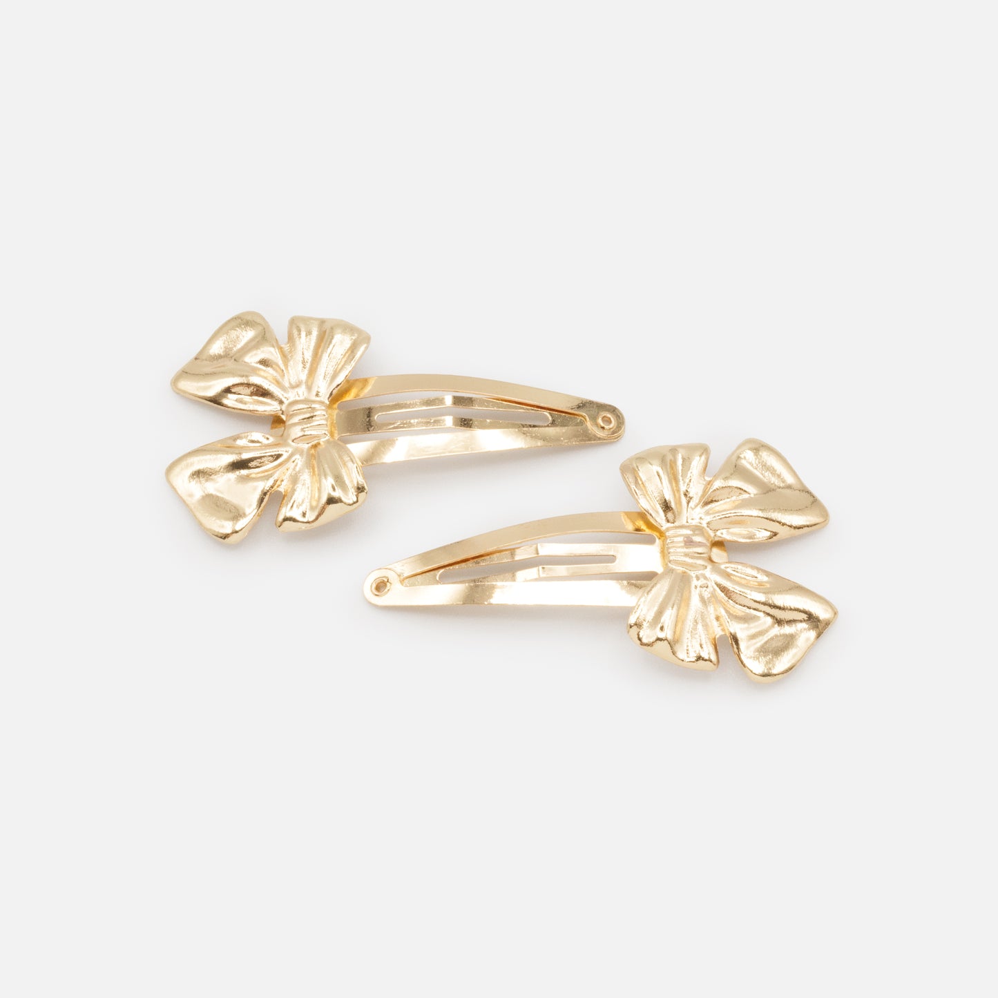 HA253C004GL - Golden metal clips duo with bow