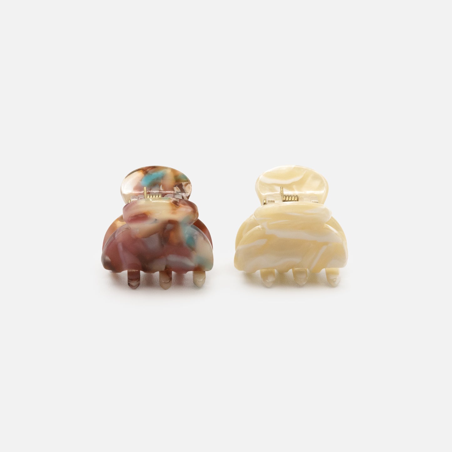 HA253W014MM - Ivory & burgundy marbled small plastic claws duo