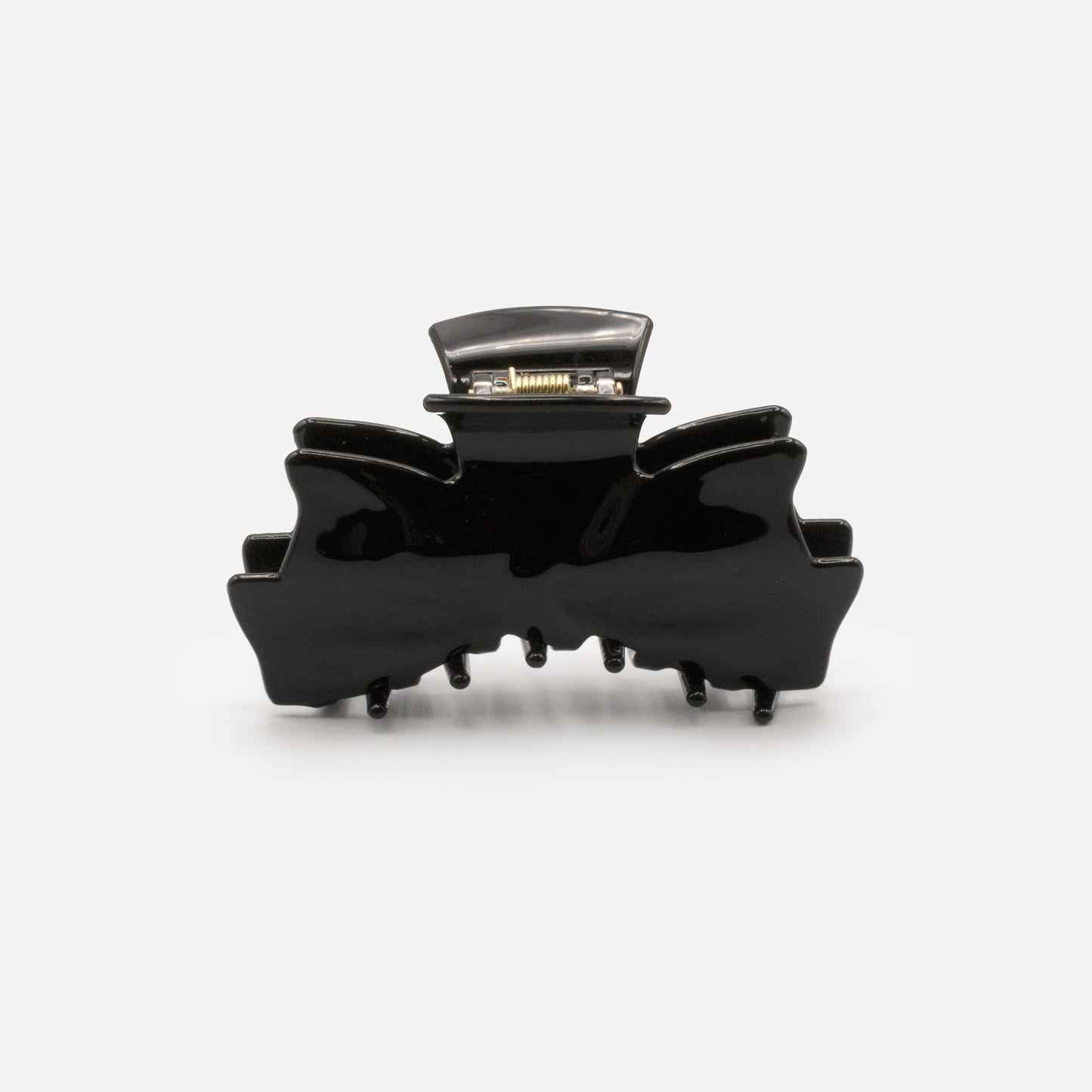 HA253W031BK - Black glossy plastic claw with bow shape