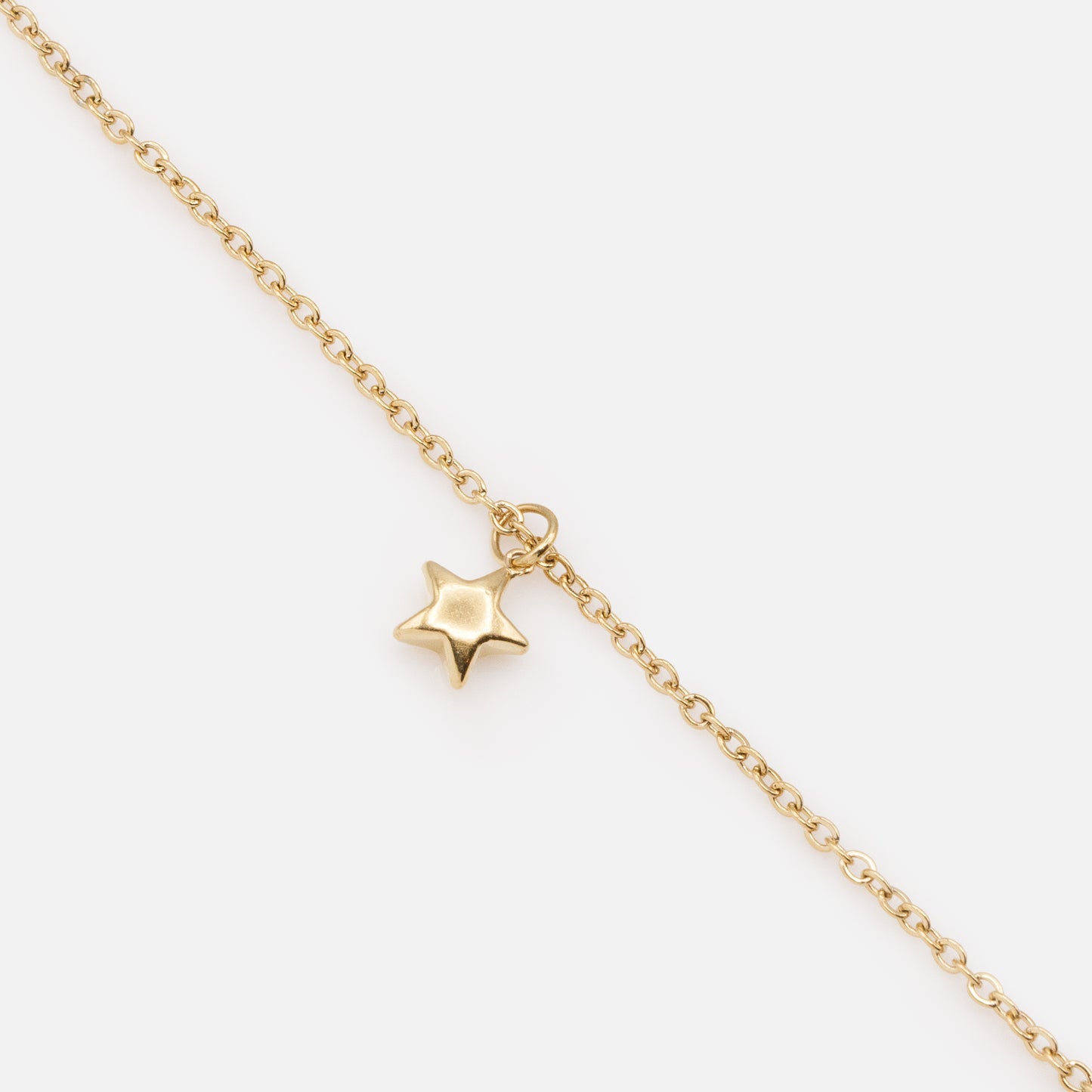 MN253N008GL - Mini golden star necklace in stainless steel