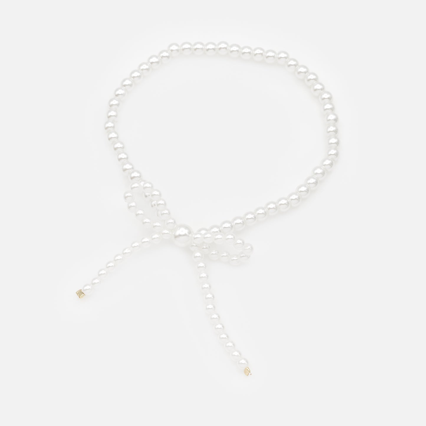 PL253B023GL - Elastic pearl bracelet with bow