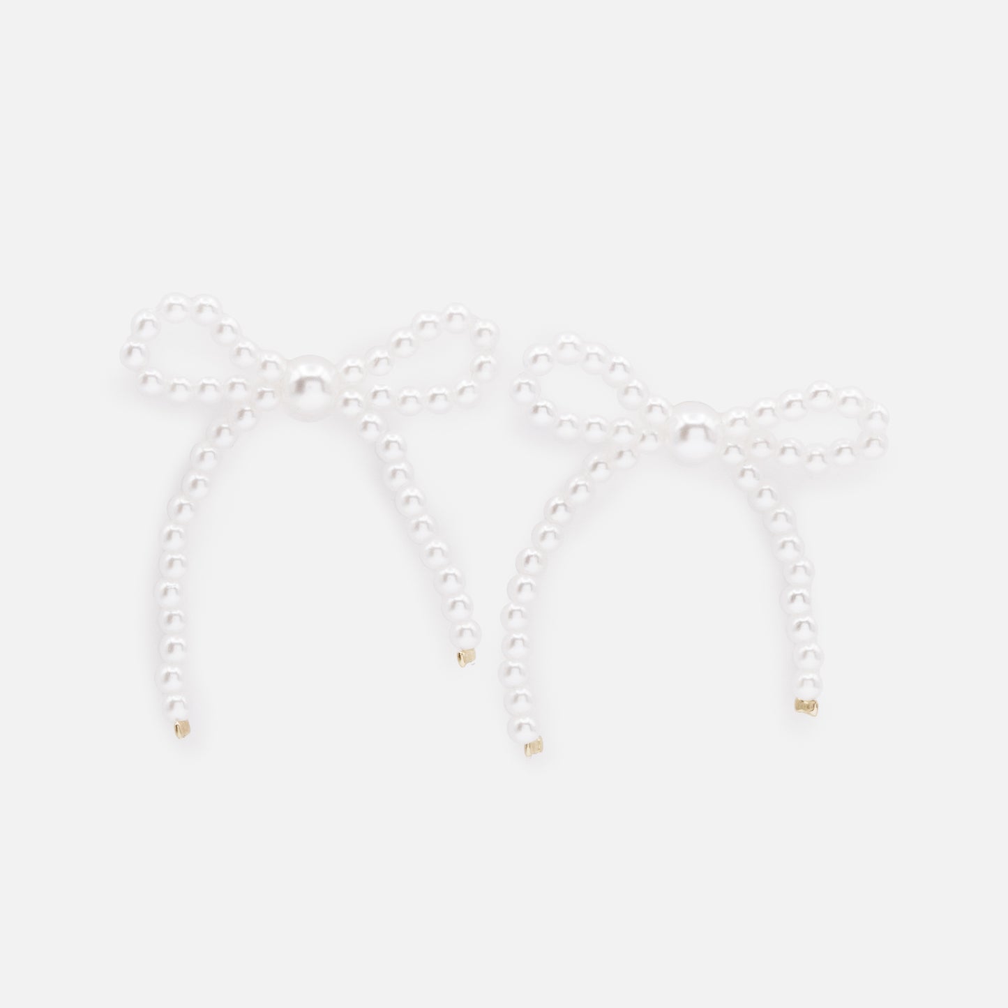 PL253E001GL - Bow shaped earrings made of pearls