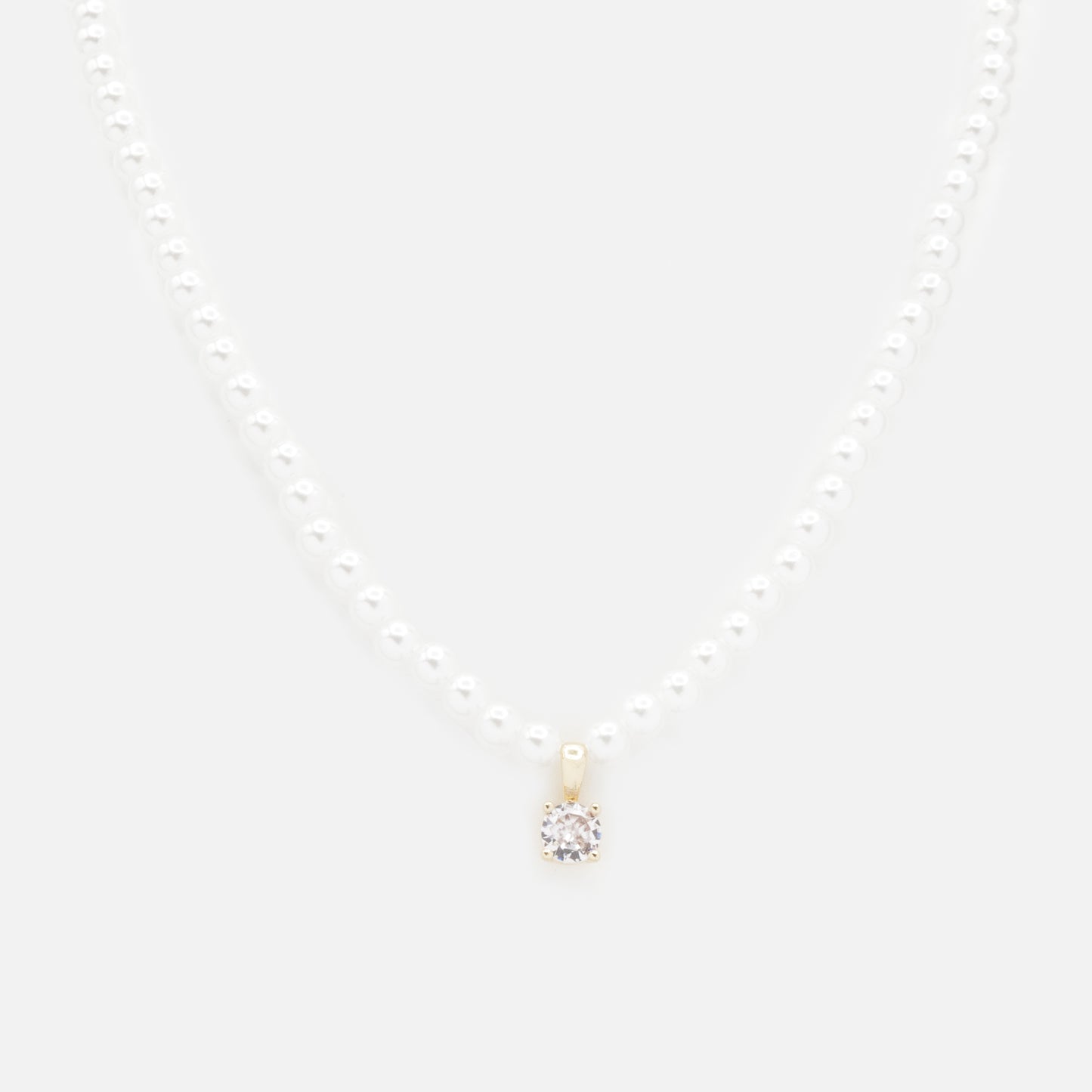 PL253N017GL - Pearl necklace with golden charm & cubic zirconia