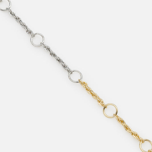 PR253B034MM - Twisted mesh and empty circles two tone bracelet