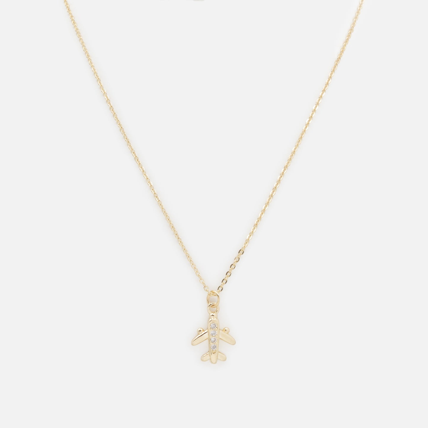 PR253N024GL - Small plane charm golden necklace with cubic zirconia