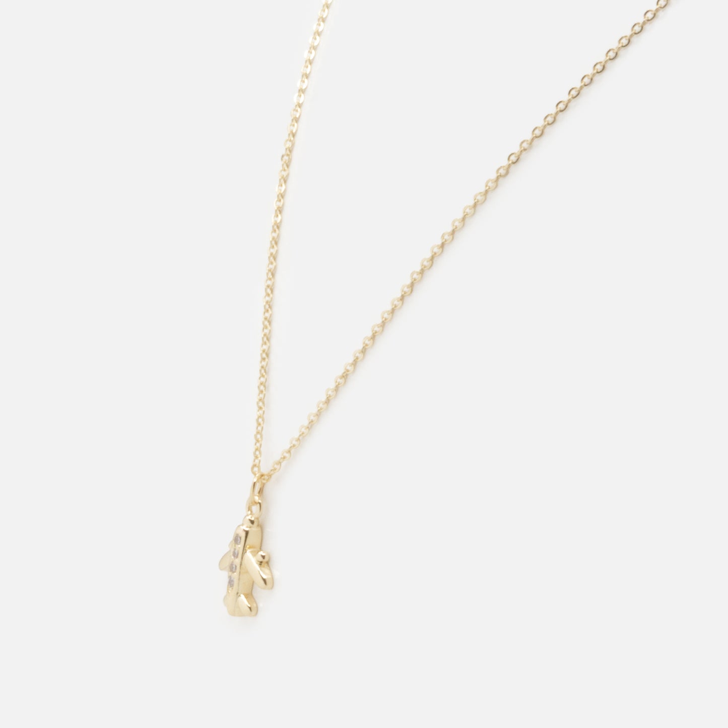 PR253N024GL - Small plane charm golden necklace with cubic zirconia