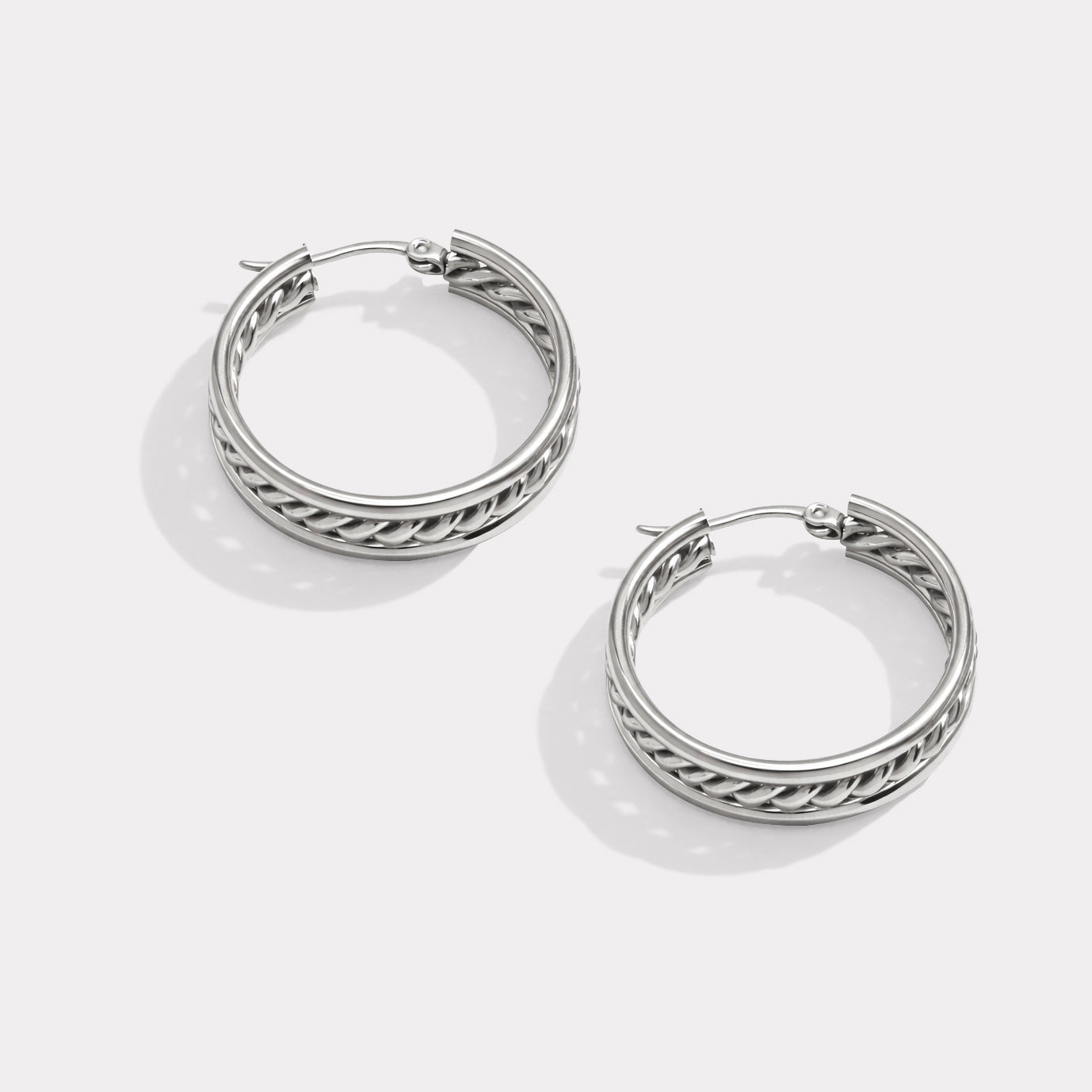 Boucles d'oreilles anneaux argentés à torsade centrale en acier inoxydable - SF251E024SL