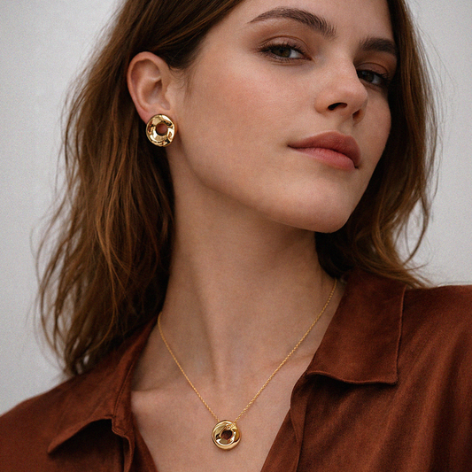 SS253K001GL - Large unperfect circles golden necklace & earrings in stainless steel