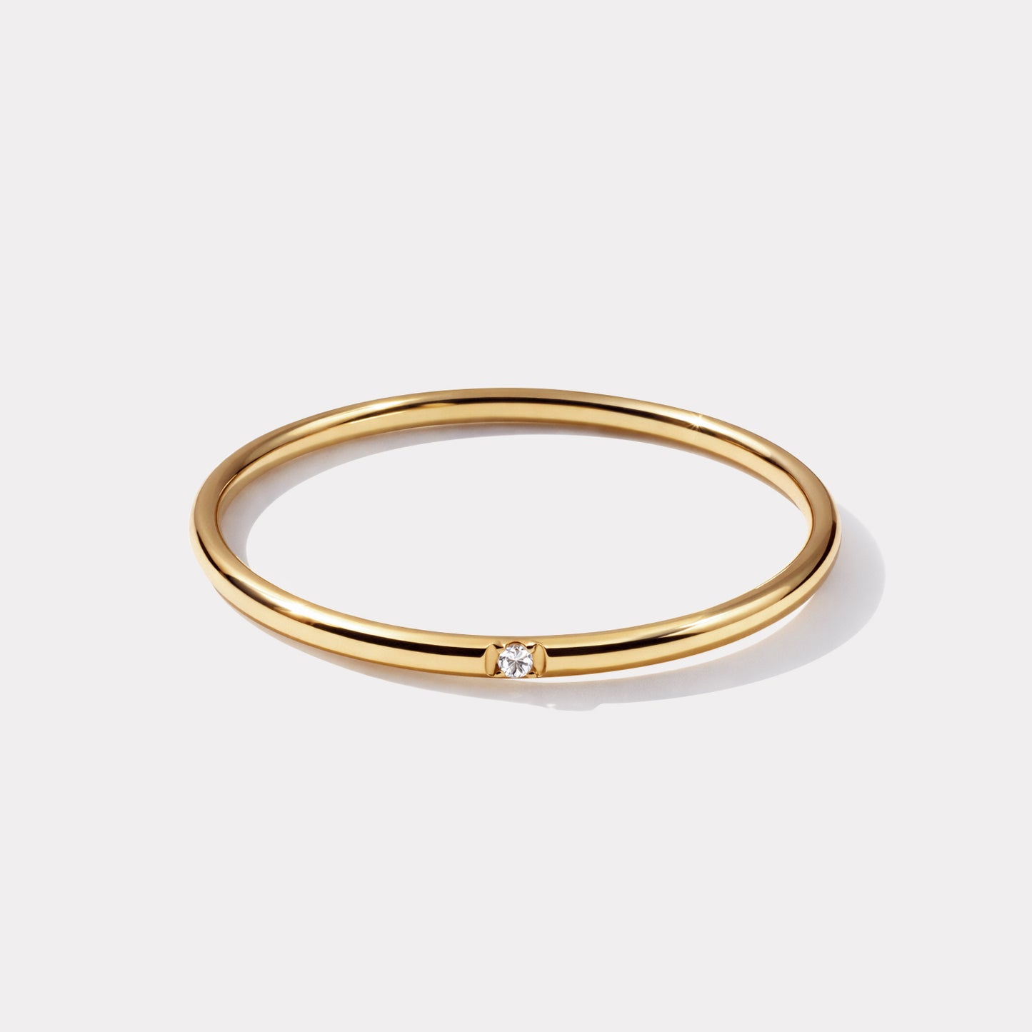 Fine bague dorée en acier inoxydable avec zircon cubique délicat - SS253R024GL