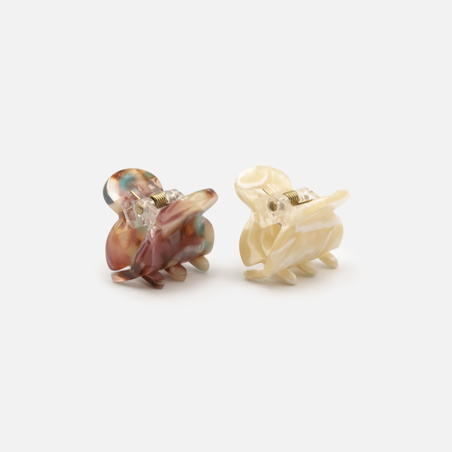 HA253W014MM - Ivory & burgundy marbled small plastic claws duo