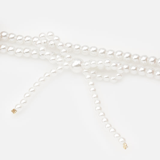PL253B023GL - Elastic pearl bracelet with bow