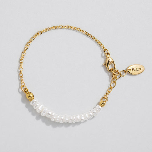 Delicate Gold-Tone Bracelet with Asymmetric Pearl Row