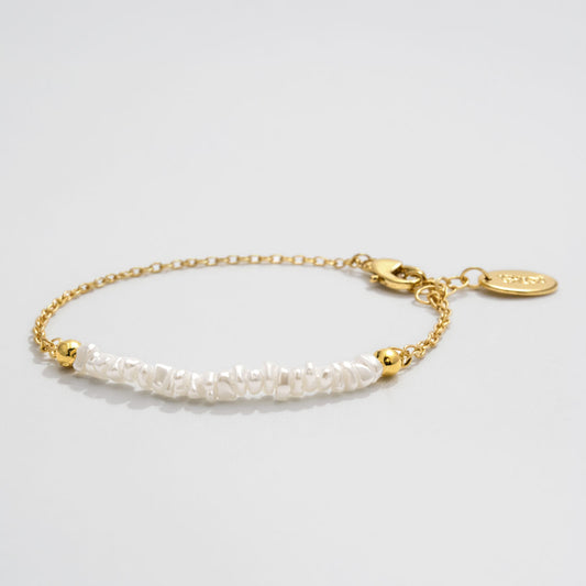 Delicate Gold-Tone Bracelet with Asymmetric Pearl Row