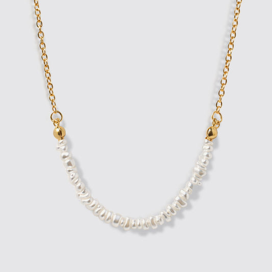 Delicate Golden Necklace with Asymmetric Pearl Row