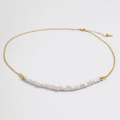 Delicate Golden Necklace with Asymmetric Pearl Row