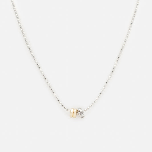 PR253N029MM - Two tone cylindrical charms silvered necklace