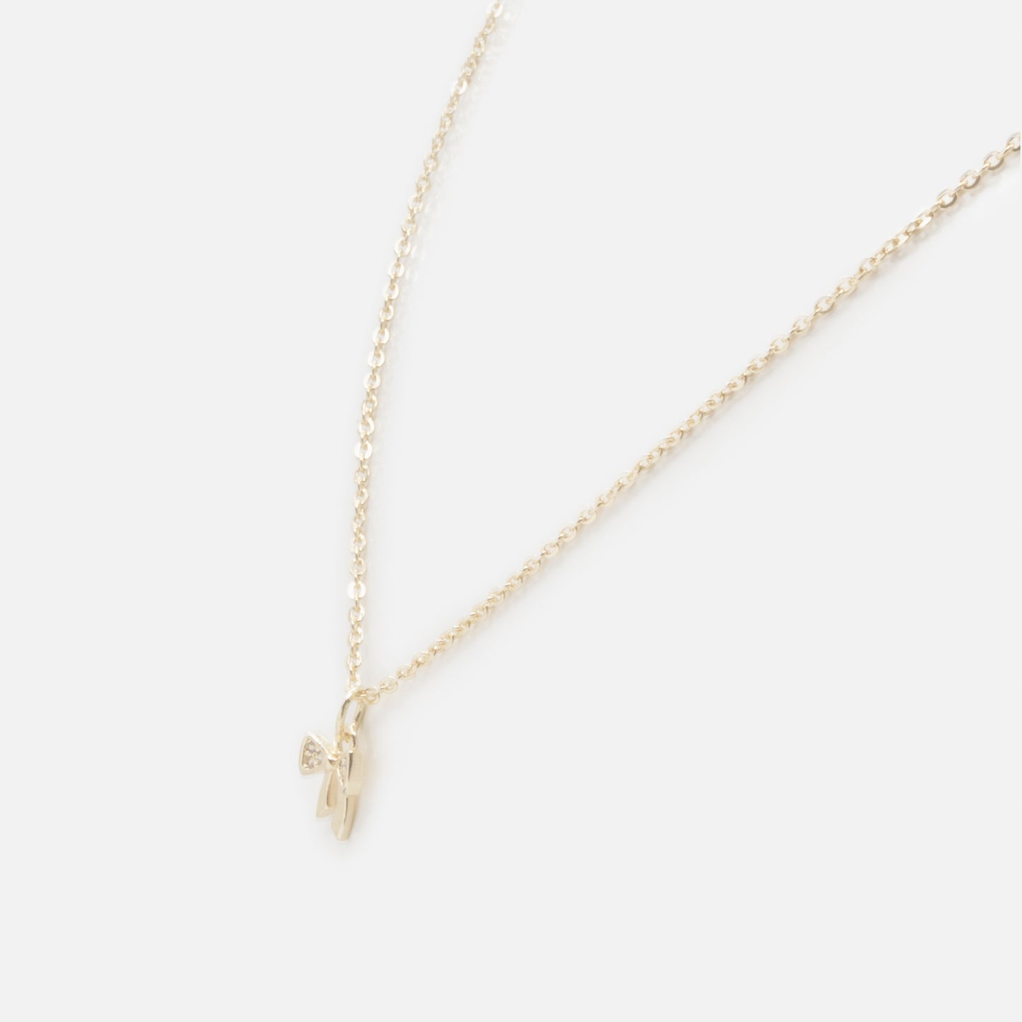 PR253N030GL - Small bow charm golden necklace with cubic zirconia