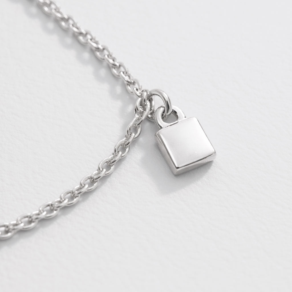 Silver-Tone Charm Bracelet with Small Square Charms