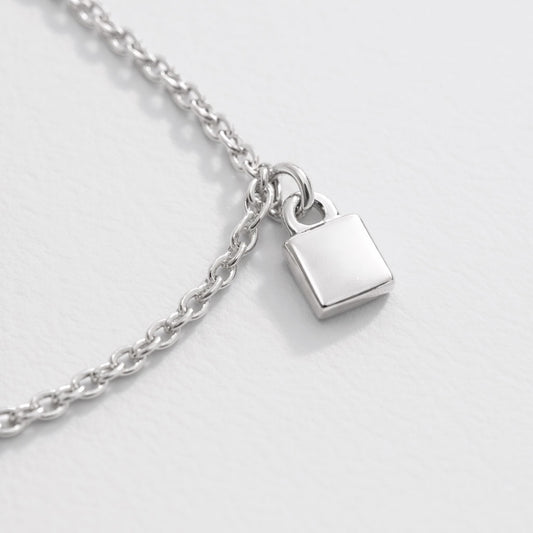 Silver-Tone Charm Bracelet with Small Square Charms