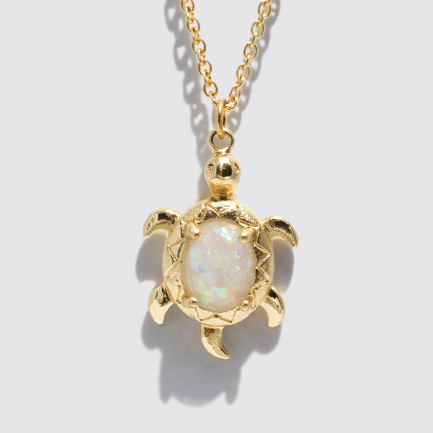 Gold-Tone Necklace with Opal-Effect Turtle Pendant