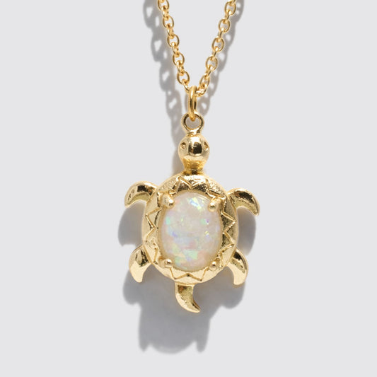 Gold-Tone Necklace with Opal-Effect Turtle Pendant