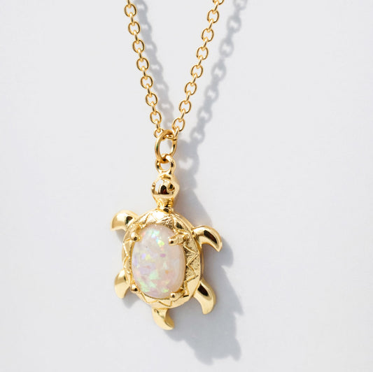 Gold-Tone Necklace with Opal-Effect Turtle Pendant