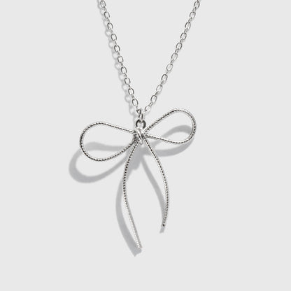 Silver-Tone Necklace with Bow Charm Pendant