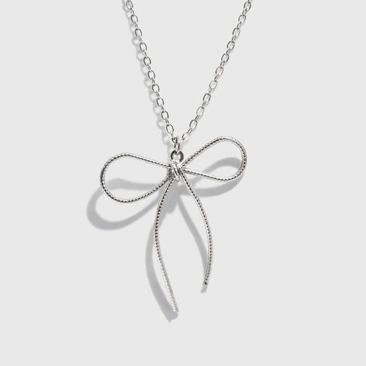 Silver-Tone Necklace with Bow Charm Pendant