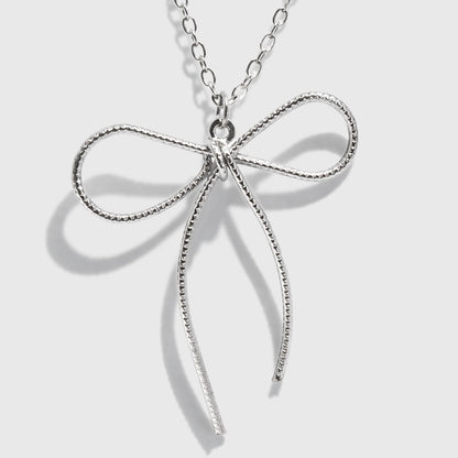 Silver-Tone Necklace with Bow Charm Pendant