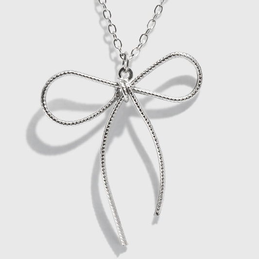 Silver-Tone Necklace with Bow Charm Pendant