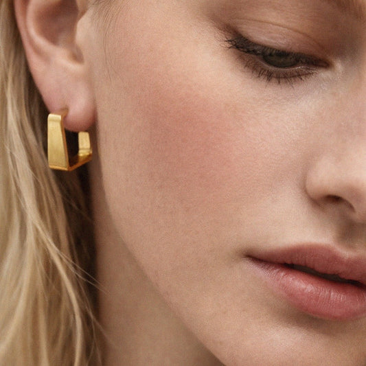 Angular golden brushed hoop earrings in stainless steel - SF243E009GL