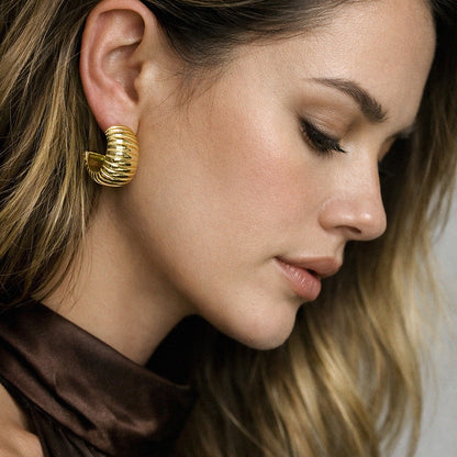 Boucles d'oreilles texturées dorées en acier inoxydable - SF251E016GL