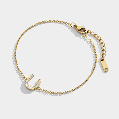 Horseshoe golden bracelet in stainless steel & cubic zirconia - SF253B026GL
