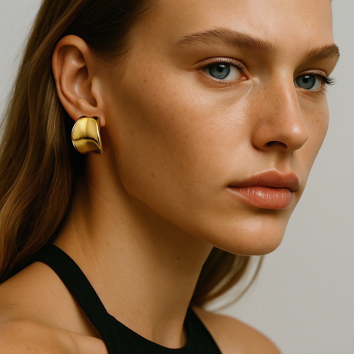 Curved golden earrings in stainless steel - SF253E001GL