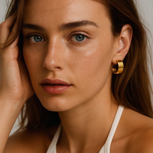 Large golden hoop earrings in stainless steel - SF253E008GL