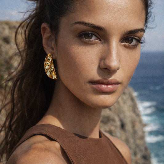 Hammered golden semi-circle earrings in stainless steel - SF253E009GL
