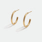 Golden hoop earrings with grooves in stainless steel - SS253E004GL