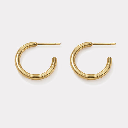 Golden hoop earrings with grooves in stainless steel - SS253E004GL