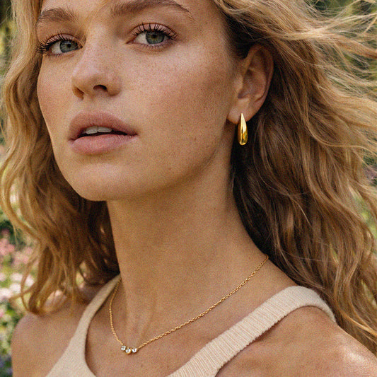 Golden necklace in stainless steel with cubic zirconia trio - SS253N014GL